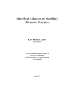 Microbial adhesion to maxillary obturator materials