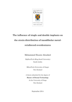 The influence of single and double implants on the strain distribution of mandibular metal-reinforced overdentures