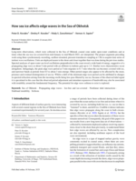 How sea ice affects edge waves in the Sea of Okhotsk